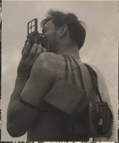 Max Dupain with his cameras by Olive Cotton from Camping trips on Culburra Beach by Max Dupain and Olive Cotton