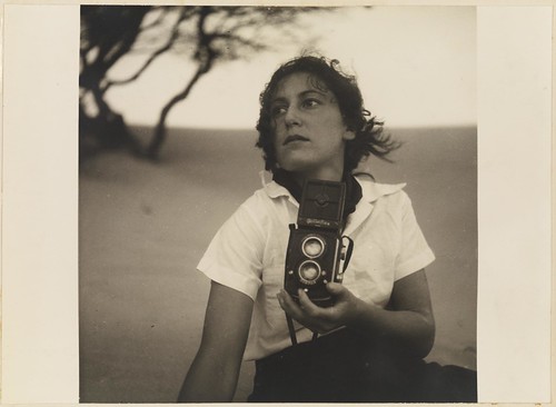 Olive Cotton, holding camera from Camping trips on Culburra Beach by Max Dupain and Olive Cotton