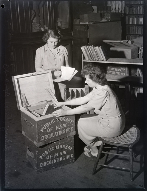 Boxing books for the Lending Library, Mitchell Building, photograph by Ivan Ives, 29.10.1943, Pix Magazine Collection