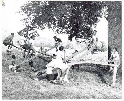 Camp Ebenezer: African American Children on Teeter-Totters